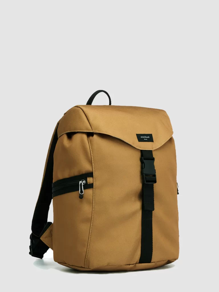 Storksak Eco backpack in the colour "toffee". A light brown / yellow back pack designed for parents, to carry all the essentials when heading out with their baby.