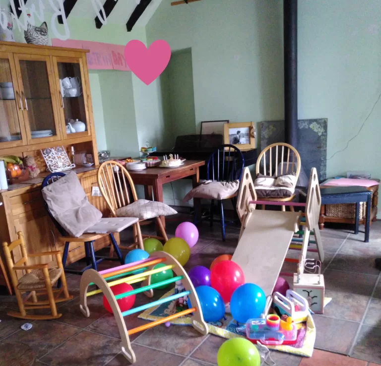 A farmhouse dining room, all set up for a sustainably planned toddler party at home.